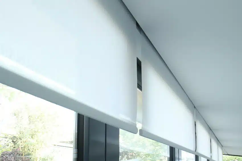 Roller blinds concealed in a modern home